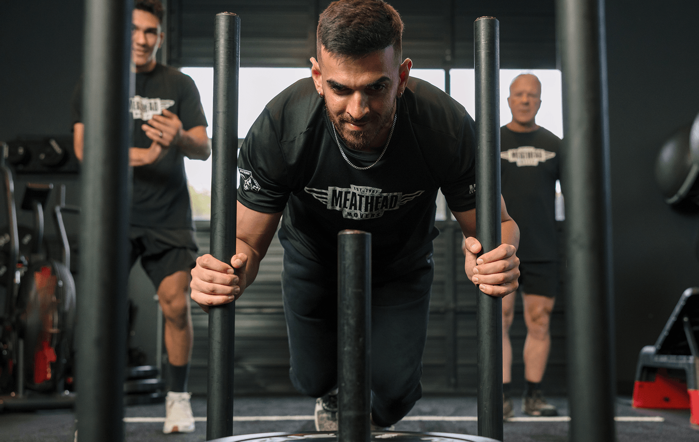 Meathead mover pushing a weighted sled during training
