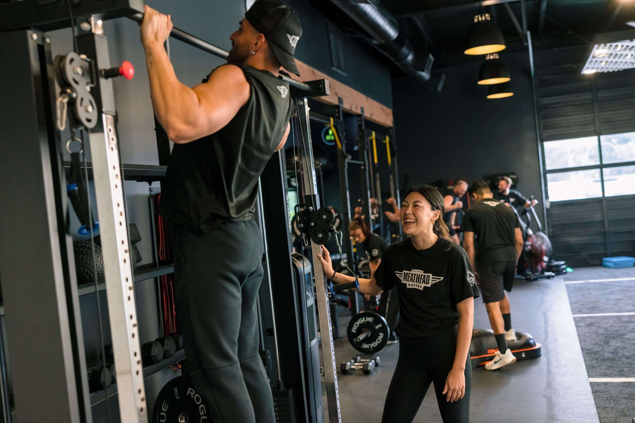 Meathead Movers athletes training together in the gym