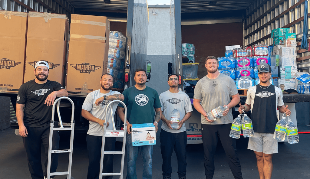 Meathead Movers team with donated water and supplies for #FillThoseTrucks