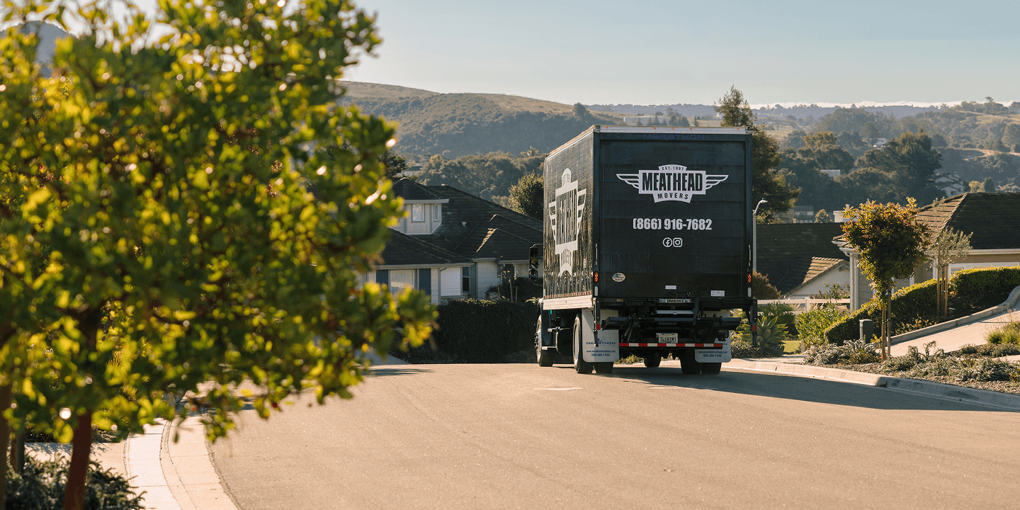 Meathead Movers truck parked on a neighborhood street