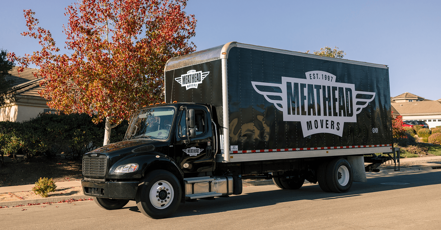 Meathead Movers box truck parked in a residential neighborhood
